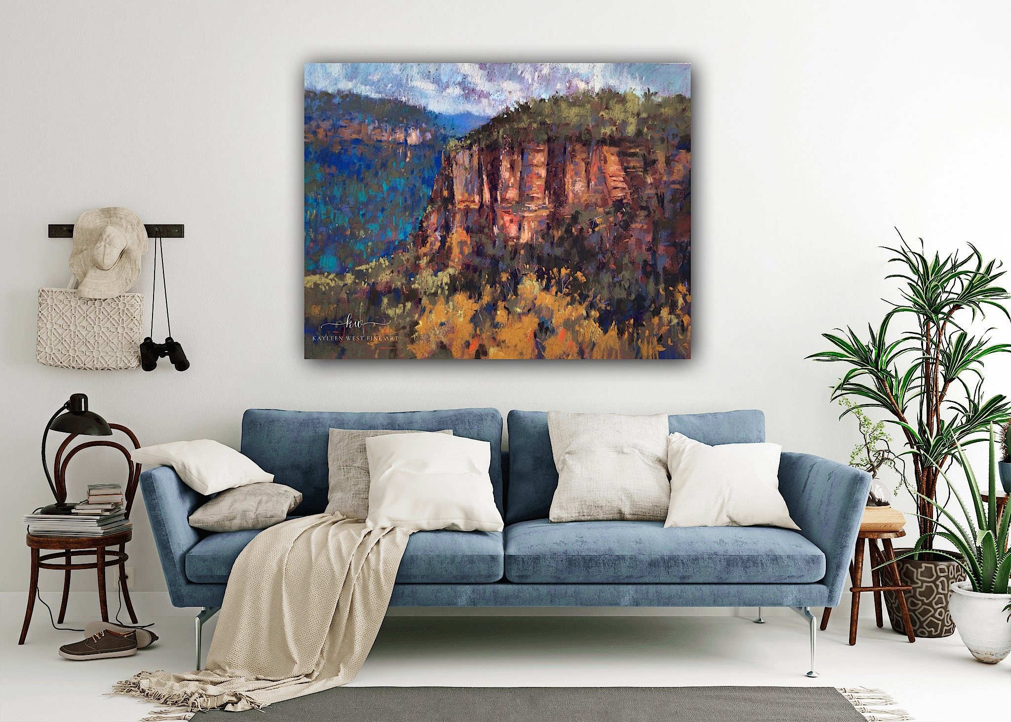 Large painting of the Blue Mountains on a feature wall.